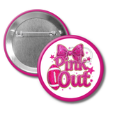 Button badge with 'Pink Out' text and bow design on a white background