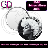A 3.5-inch round pocket mirror with the text "Bold. Black. Brilliant." encircling a black-and-white illustration of a woman with an afro. The mirror’s back features the empowering design by Chi 9 Designs.