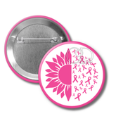 Button badge with pink sunflower and breast cancer awareness ribbons on a white background