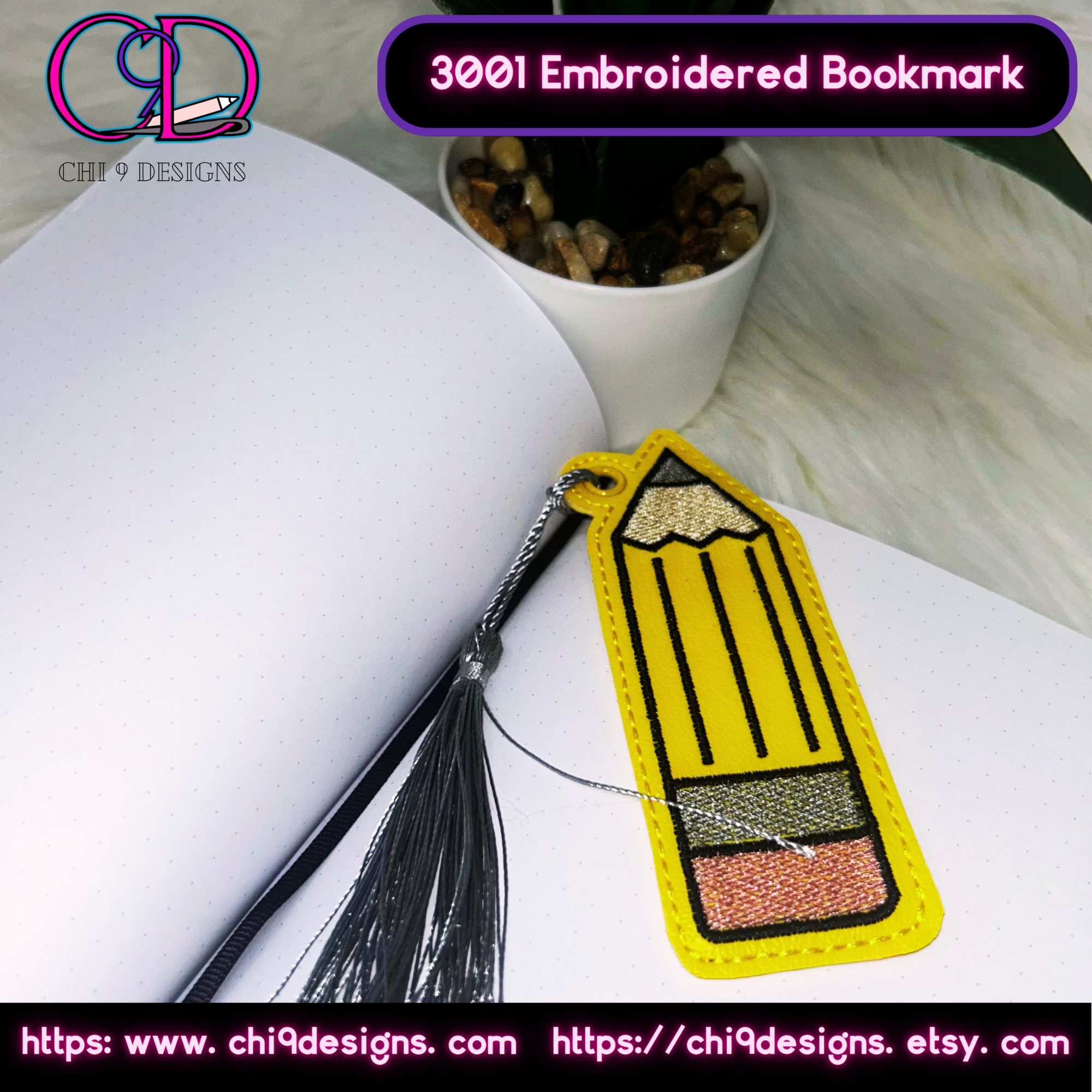 An embroidered pencil bookmark with a silver tassel placed inside an open book. The bright yellow design adds a playful touch, perfect for marking your page in style