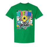 A green short-sleeve crewneck t-shirt featuring a colorful 'FIFTH grade' graphic on the front, complete with a lightbulb, stars, hearts, and school-themed doodles, shown against a plain white background.