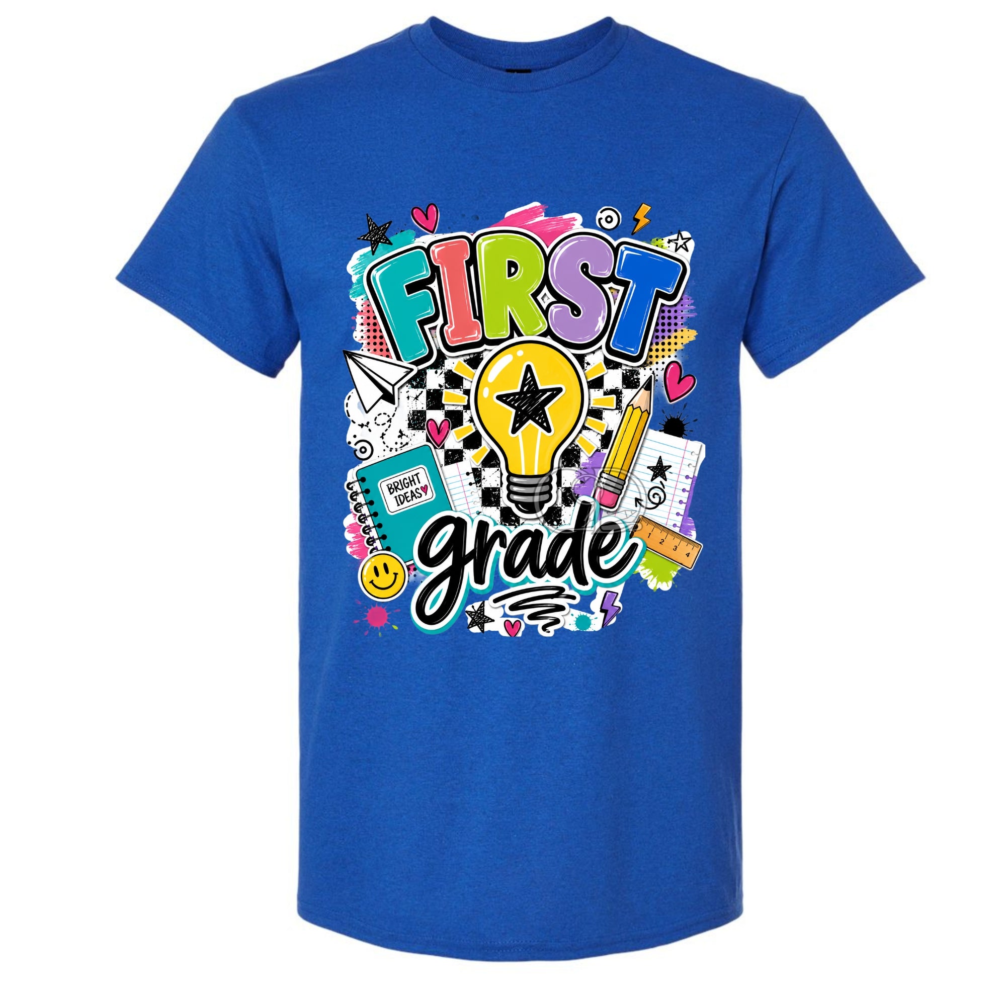 A royal blue short-sleeve t-shirt with a colorful 'FIRST grade' graphic on the front, featuring school-themed doodles like a lightbulb, pencil, notebook, and stars.