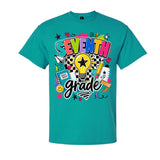 A teal short-sleeve crewneck t-shirt featuring a colorful 'SEVENTH grade' graphic on the front, complete with a lightbulb, stars, hearts, and school-themed doodles, shown against a plain white background.