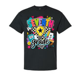 A black short-sleeve crewneck t-shirt featuring a colorful graphic design on the front with the words 'SEVENTH grade' and school-themed doodles like a lightbulb, pencil, and notebook.