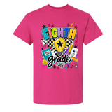 A bright pink short-sleeve t-shirt with a colorful 'Eighth Grade' graphic on the front, featuring school-themed doodles and text, shown against a plain white background.