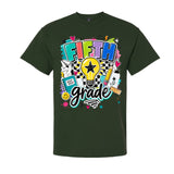A dark forest green short-sleeve t-shirt with a colorful 'FIFTH grade' graphic on the front, featuring school-themed doodles like a lightbulb, pencil, and notebook.