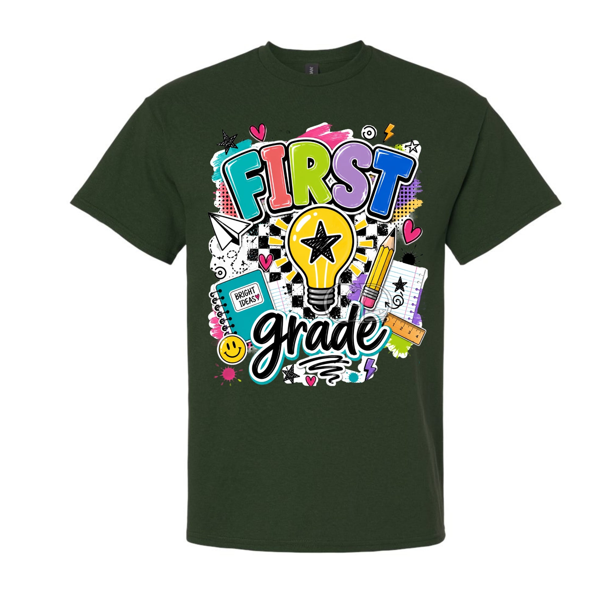 A forest green short-sleeve crewneck t-shirt featuring a colorful 'First Grade' graphic on the front, complete with a lightbulb, pencil, notebook, and checkered patterns, shown against a plain white background.