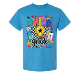 A heather blue short-sleeve t-shirt with a colorful 'Third Grade' graphic on the front, featuring school-themed doodles and text, shown against a plain white background.