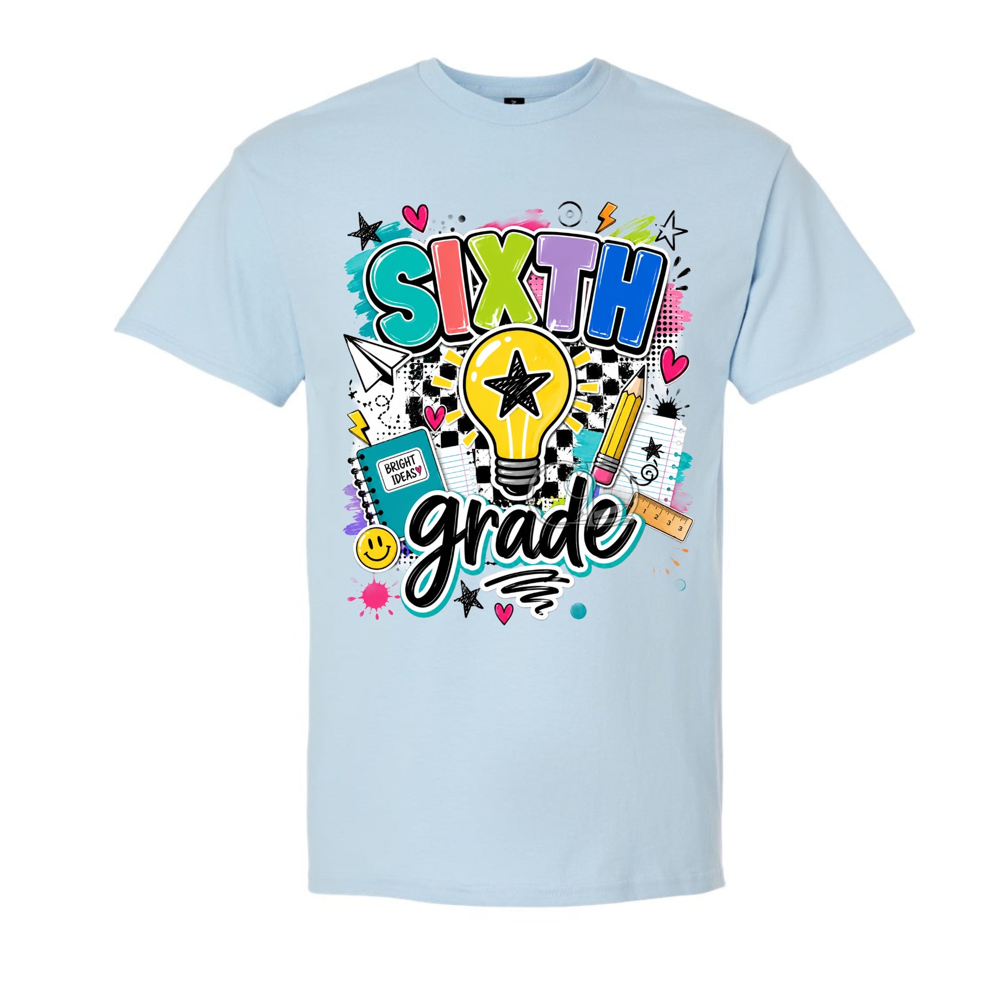 A light blue short-sleeve t-shirt with a colorful 'SIXTH grade' graphic on the front, featuring a lightbulb, notebook, pencil, and stars, shown against a plain white background.