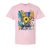 A light pink short-sleeve crewneck t-shirt featuring a colorful 'Eighth Grade' graphic on the front, complete with a lightbulb, stars, hearts, and school supplies.