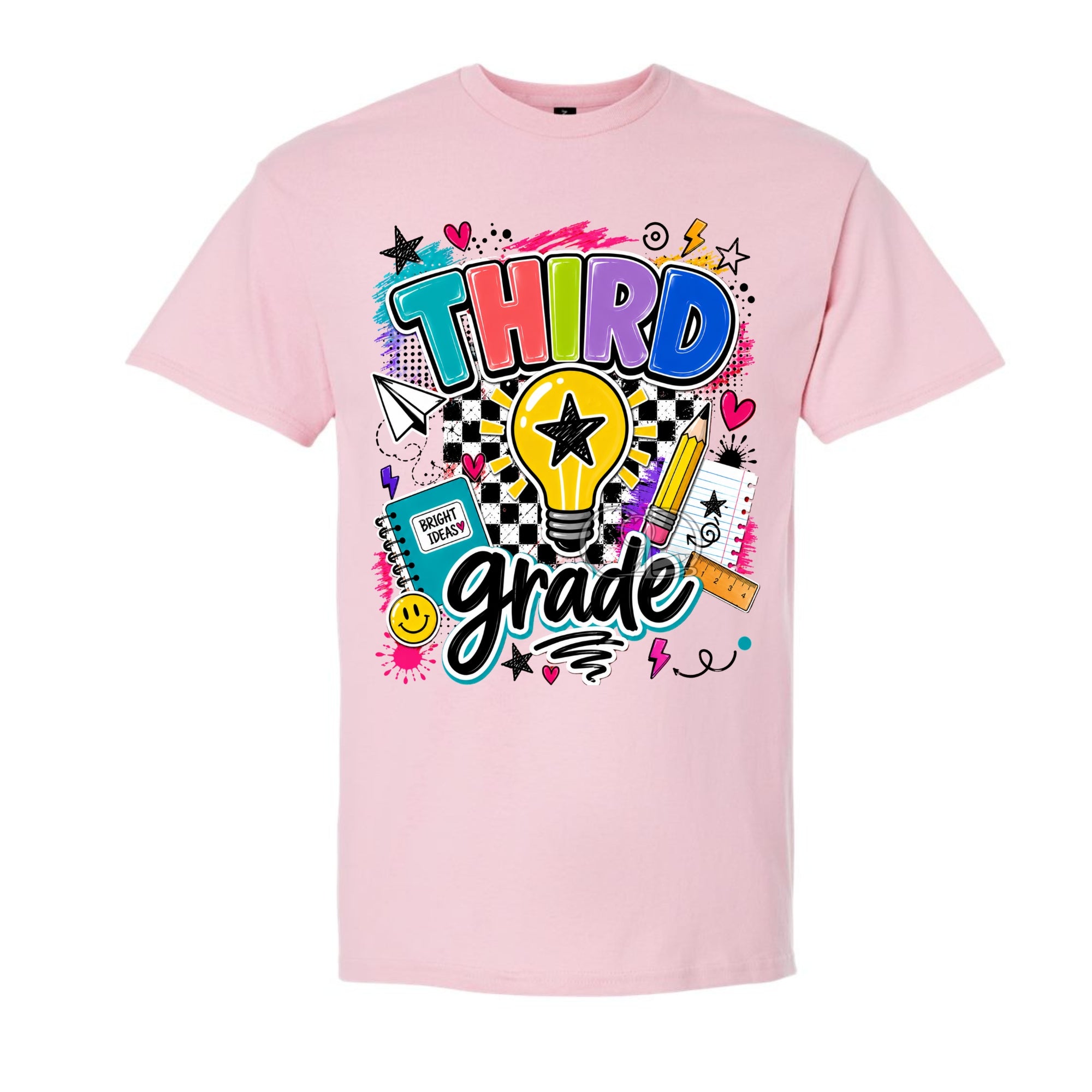 A light pink short-sleeve crewneck t-shirt featuring a colorful graphic print on the front with the words 'THIRD grade' in stylized lettering, surrounded by school-themed doodles like a lightbulb, notebook, pencil, and stars.