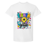 A white short-sleeve crewneck t-shirt featuring a colorful 'EIGHTH grade' graphic on the chest with doodle-style text, a lightbulb, stars, and school-themed icons.