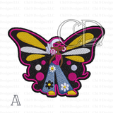 Afrocentric embroidered butterfly girl patch featuring a stylish woman with an afro, pink sunglasses, and yellow-and-black wings with pink accents, wearing blue denim bell bottoms and yellow shoes.”