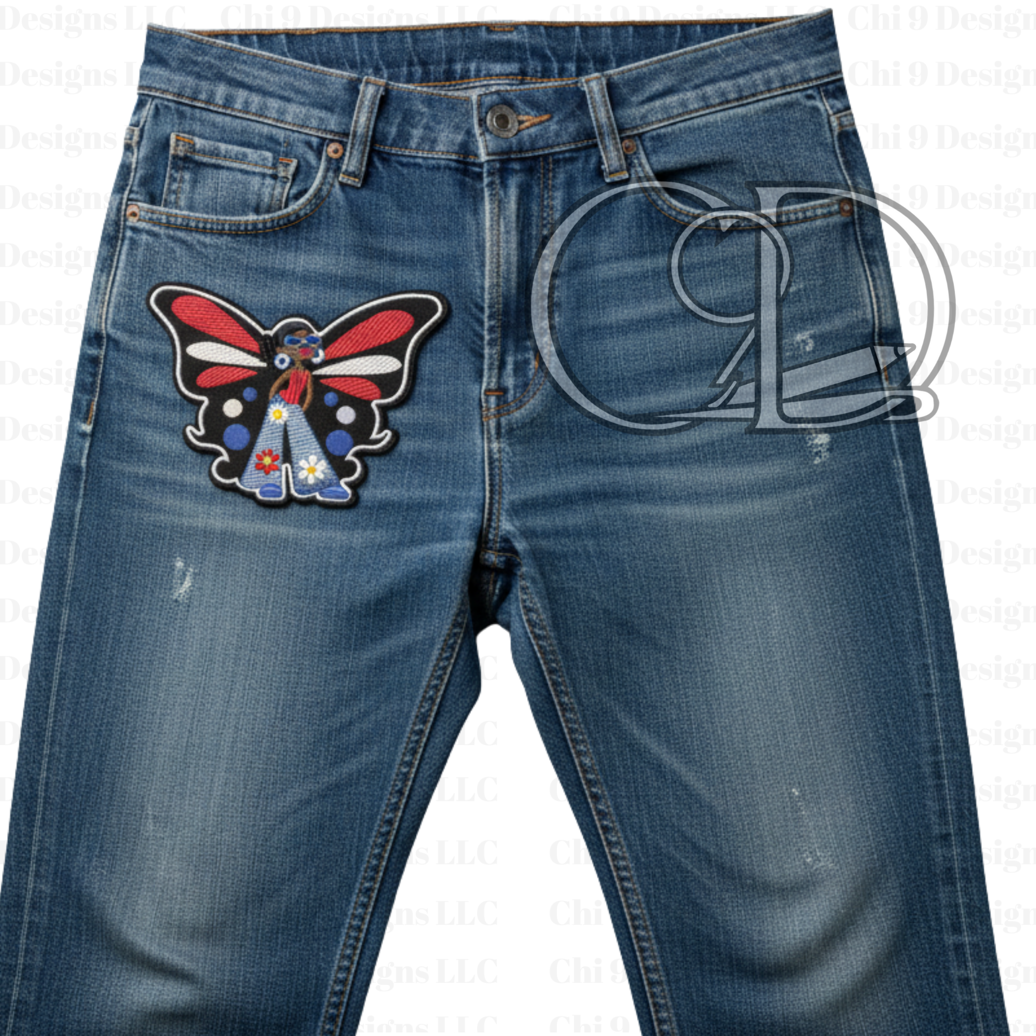 Afro butterfly girl embroidered patch with red, blue, and white wings applied to the upper thigh of a pair of blue denim jeans, showcasing bold cultural style and DIY fashion.