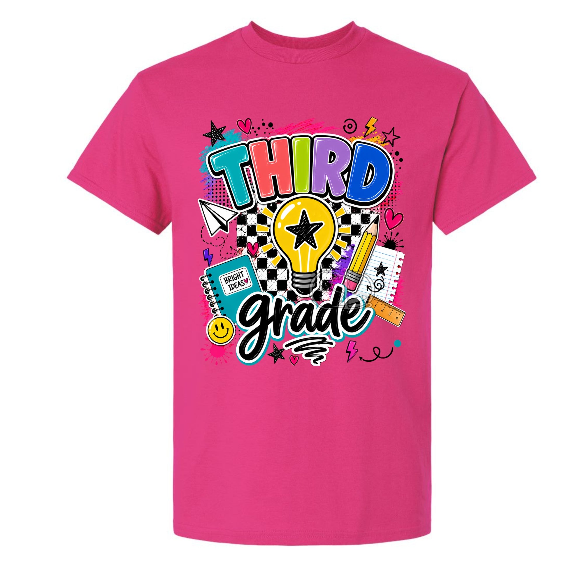 A bright pink short-sleeve t-shirt with a colorful retro-style graphic on the front that reads 'THIRD grade' in playful multicolored lettering, surrounded by school-themed doodles like a lightbulb, notebook, pencil, and stars.
