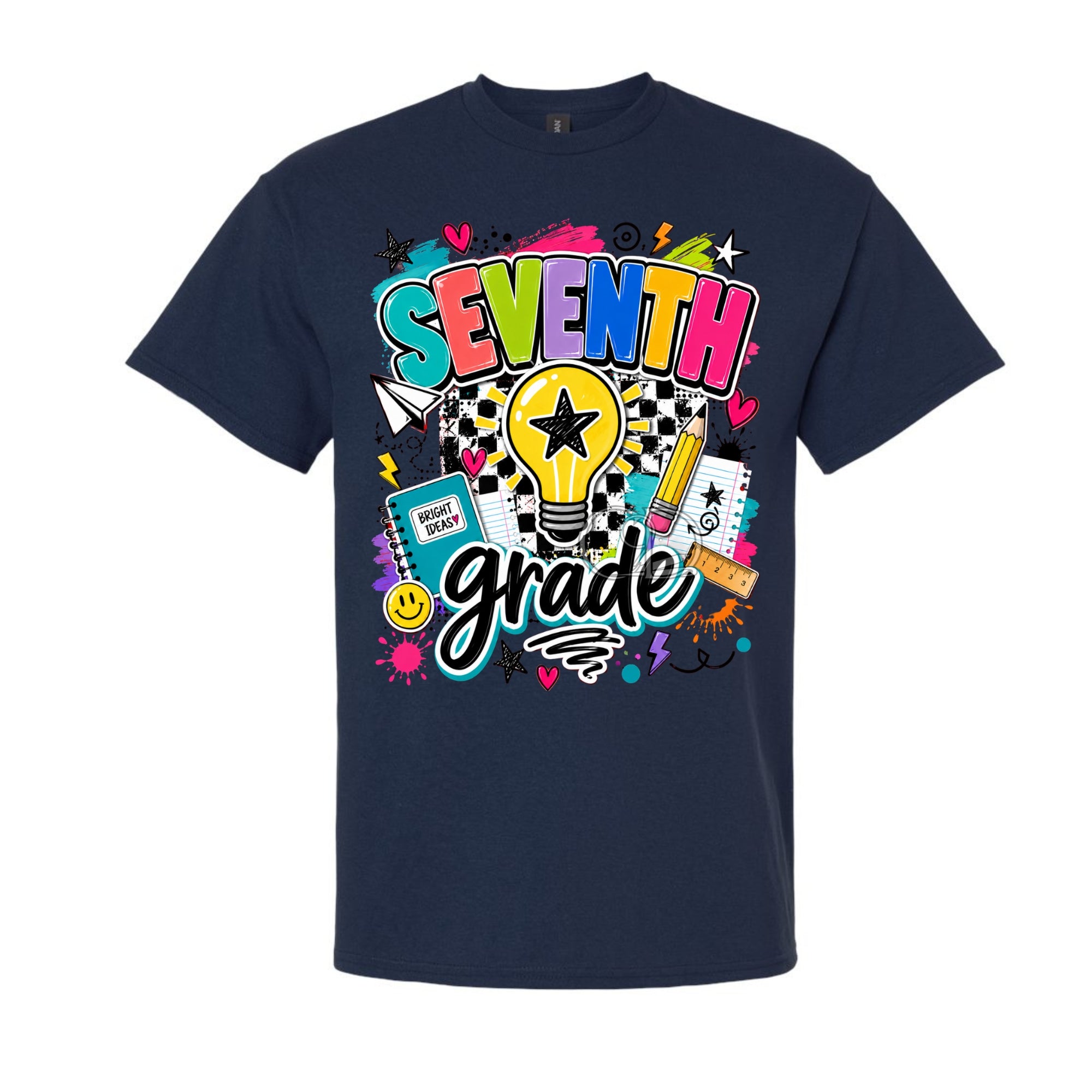 A navy blue short-sleeve t-shirt with a colorful 'SEVENTH grade' graphic on the front, featuring a lightbulb, pencil, notebook, and checkered pattern, shown against a plain white background.