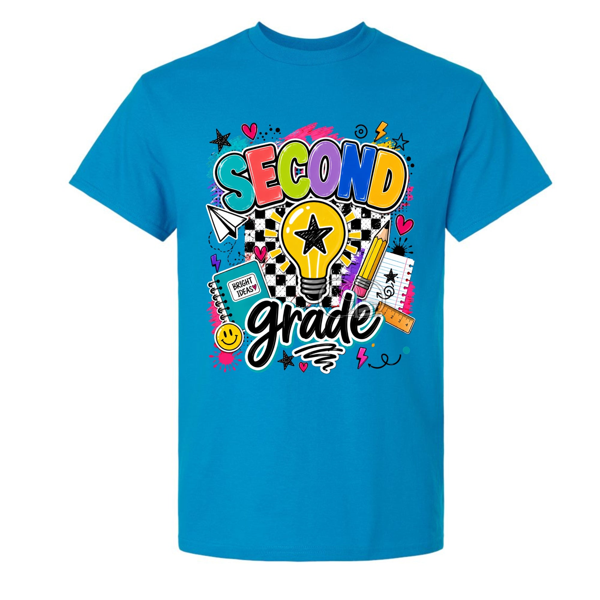 A Sapphire short-sleeve t-shirt with a colorful 'Second Grade' school-themed graphic on the chest, featuring a lightbulb, stars, and school supplies, shown on a plain white background.