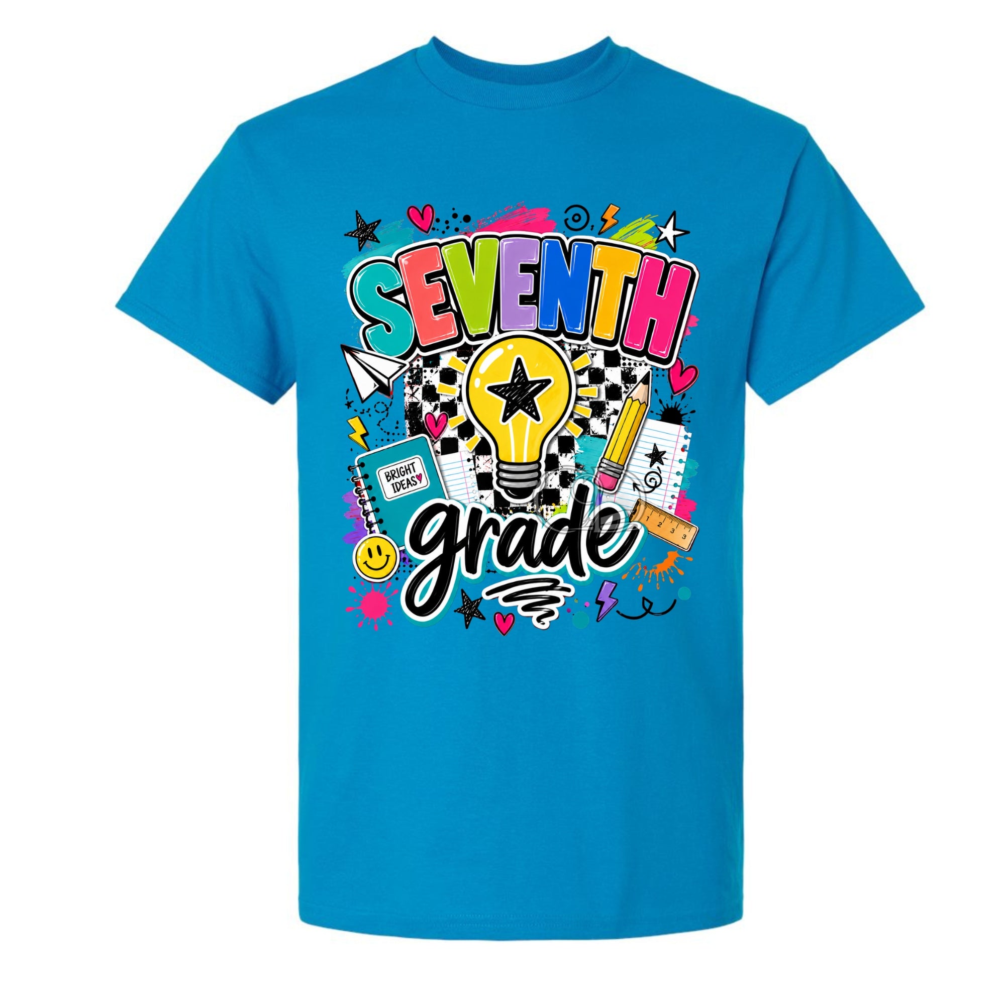 A bright blue short-sleeve t-shirt with a colorful 'SEVENTH grade' graphic on the front, featuring school-themed doodles and icons like a lightbulb, pencil, notebook, and stars.