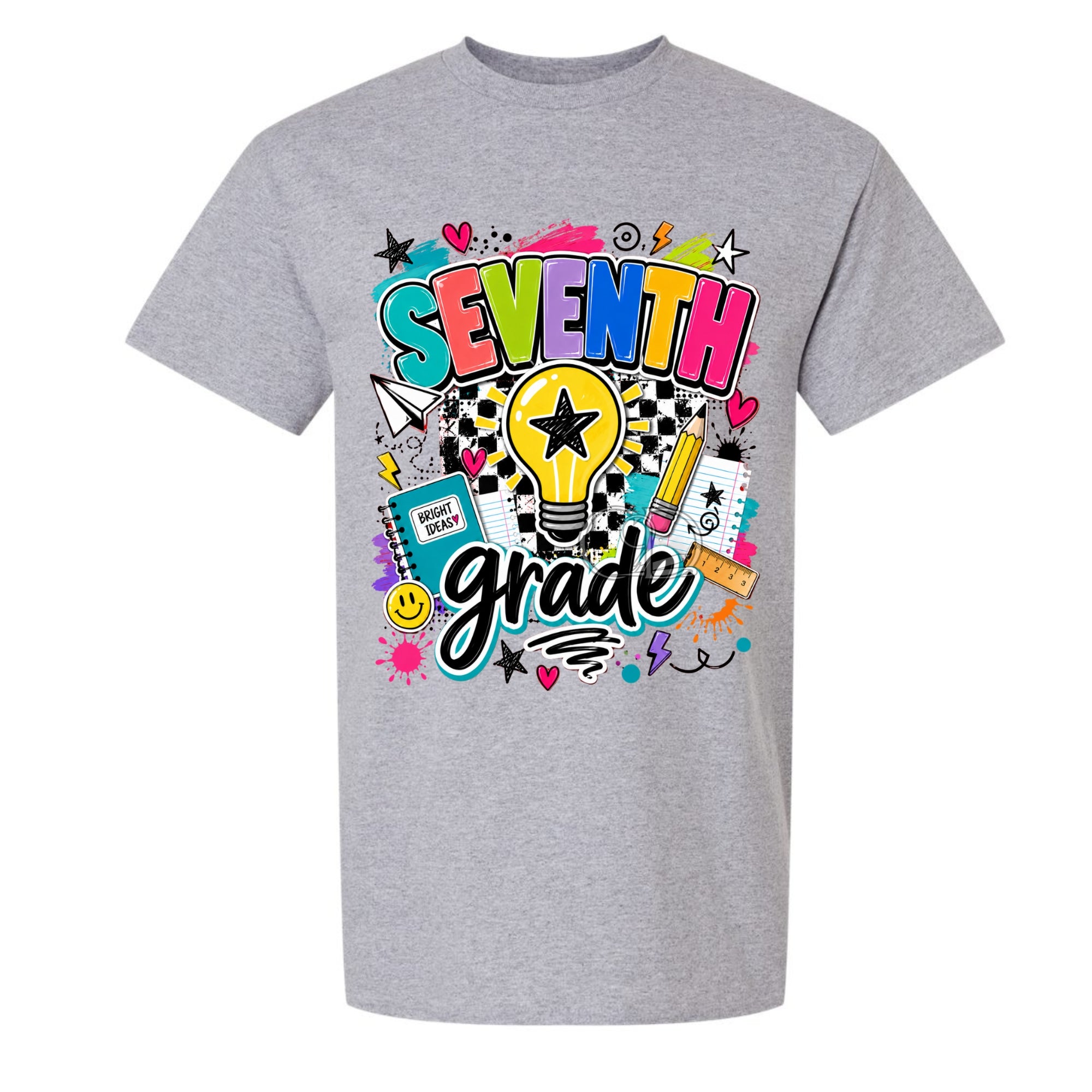A heather gray short-sleeve t-shirt with a colorful graphic on the front that reads 'SEVENTH grade' surrounded by school-themed doodles like a lightbulb, pencil, notebook, and stars.
