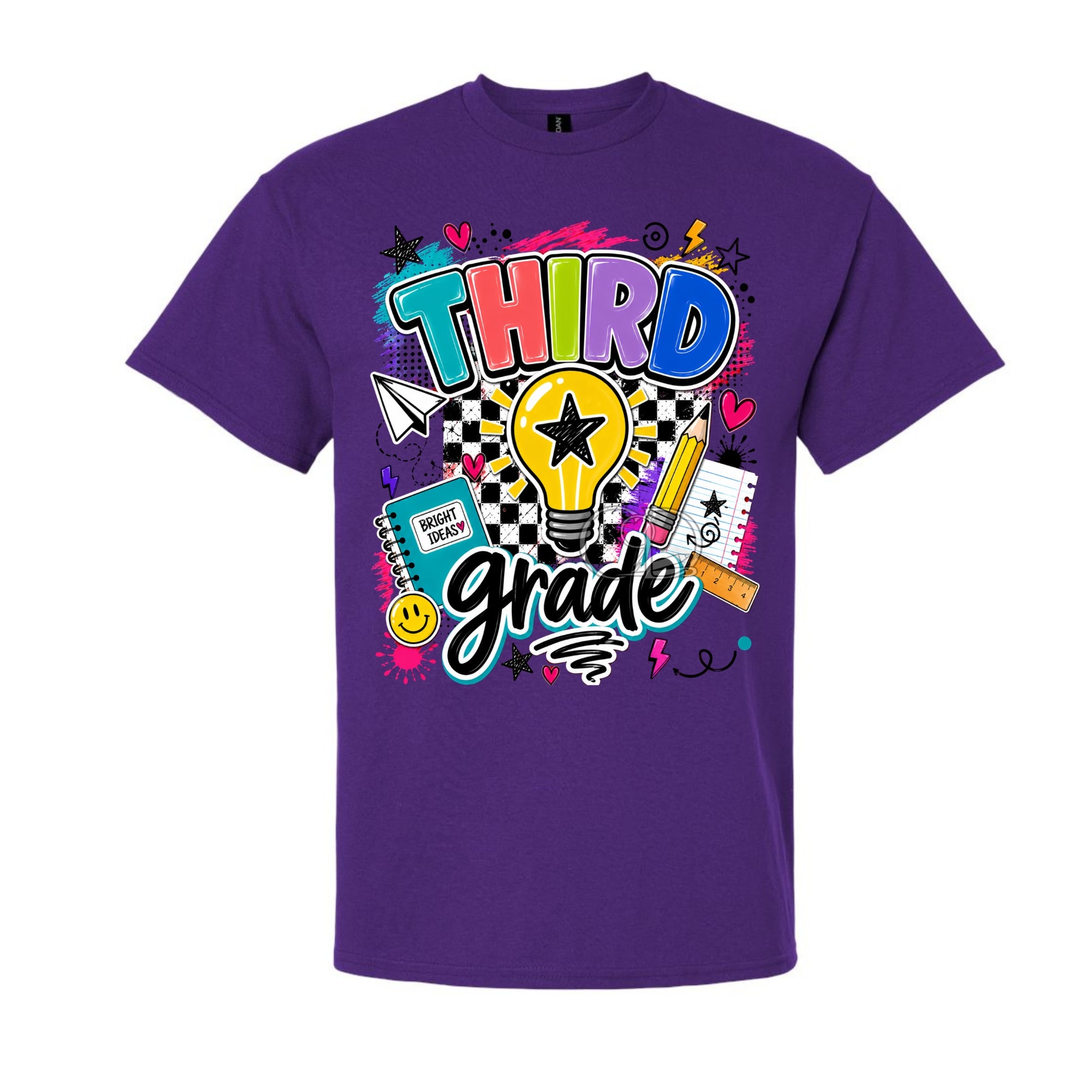 A purple short-sleeve crewneck t-shirt featuring a colorful 'Third Grade' graphic on the front, complete with a lightbulb, checkered pattern, and school-themed doodles, shown against a plain white background.