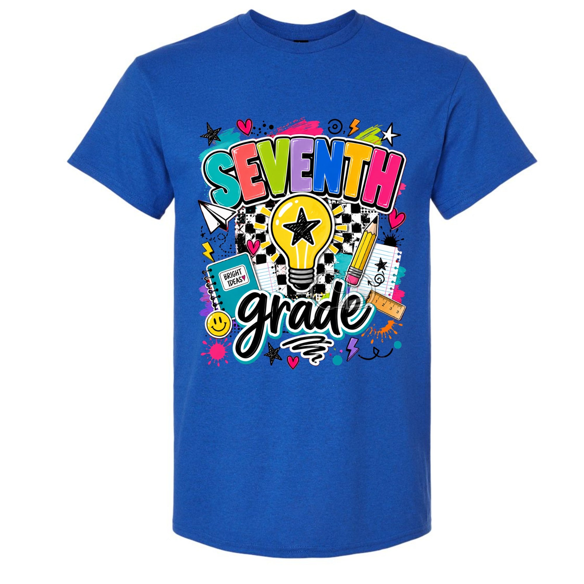 A royal blue short-sleeve t-shirt with a colorful 'SEVENTH grade' graphic on the front, featuring a lightbulb, pencil, notebook, and stars on a white background.