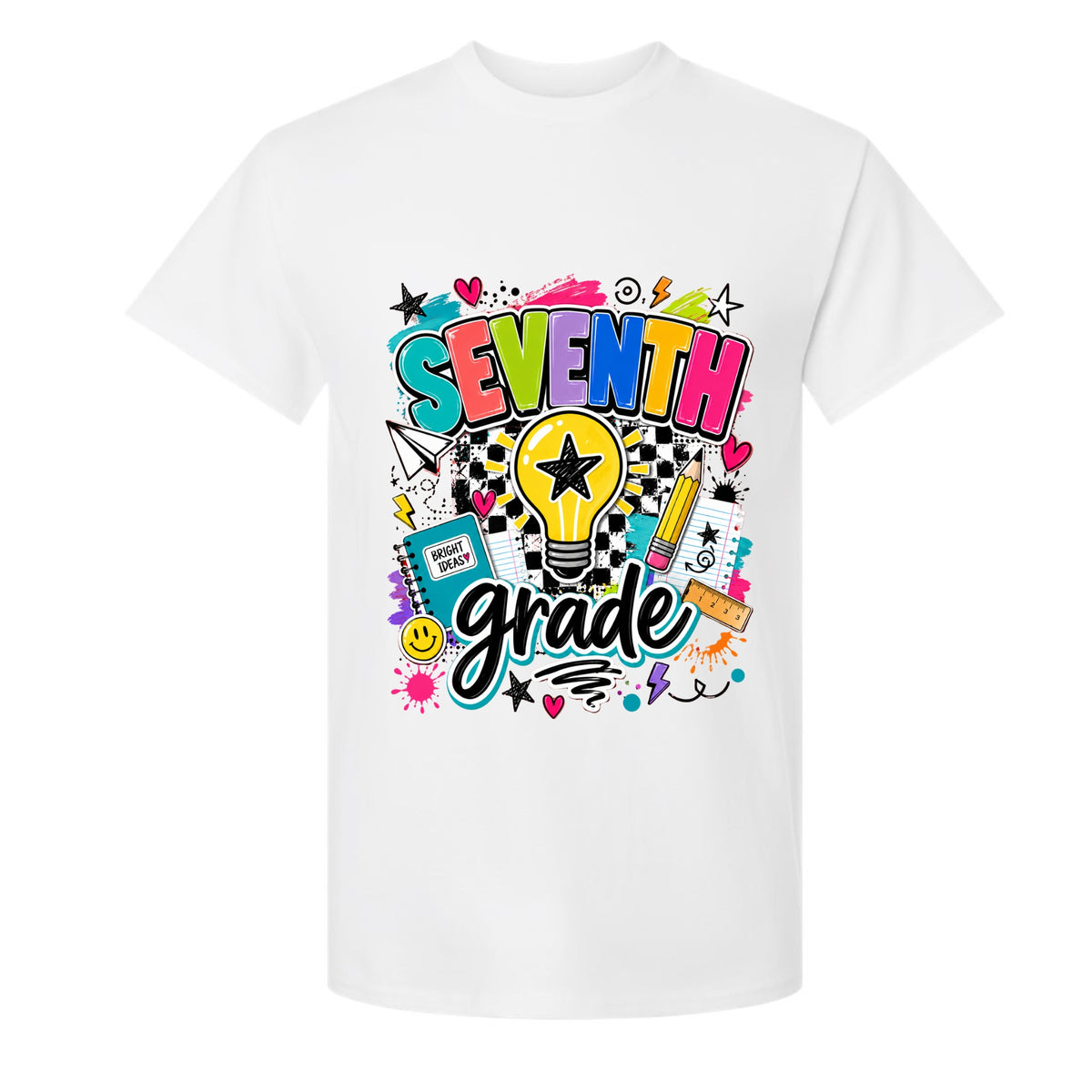 A white short-sleeve crewneck t-shirt featuring a colorful 'SEVENTH grade' graphic on the front, complete with a lightbulb, stars, hearts, and school supplies.